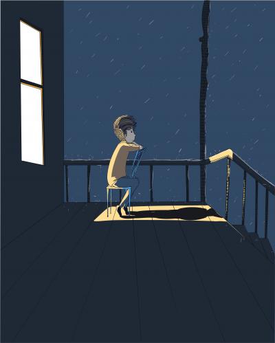 夜晚露台上看下雨的孤独男孩